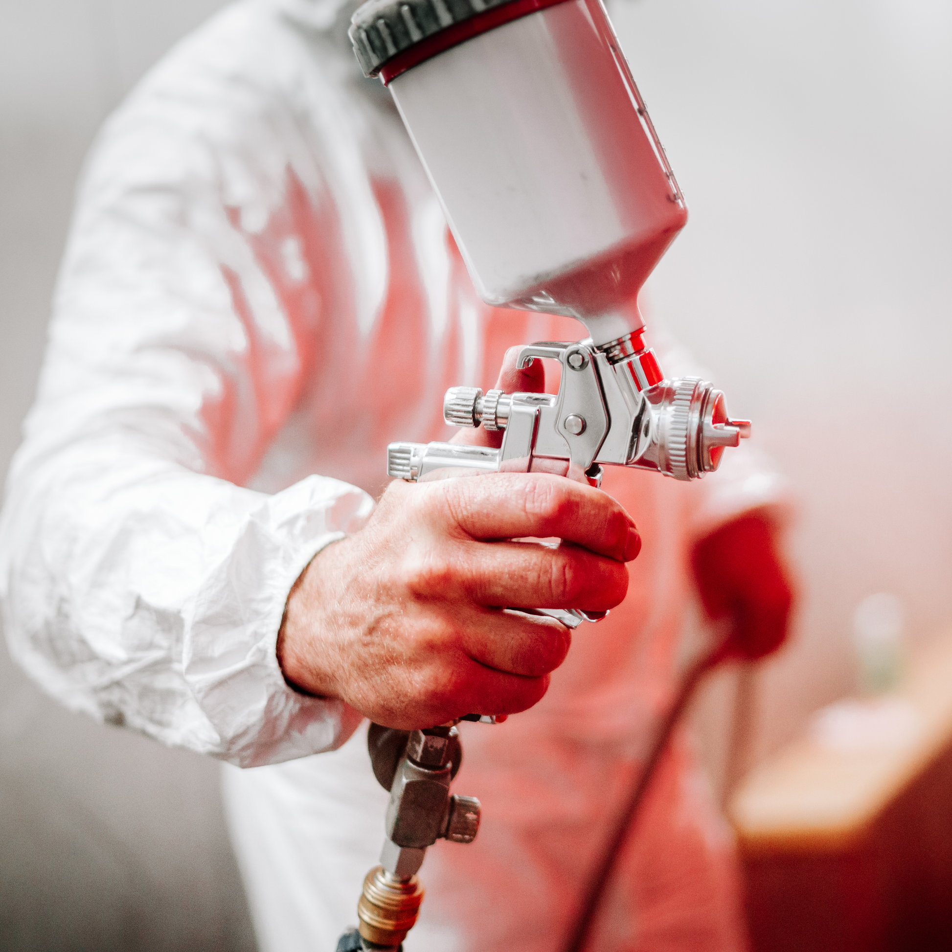 Microporous Protective Tyvek Coverall Suits being used for painting